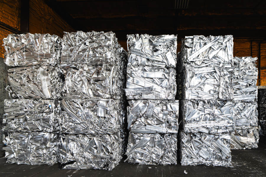 Stacks of shredded aluminum in bricks.