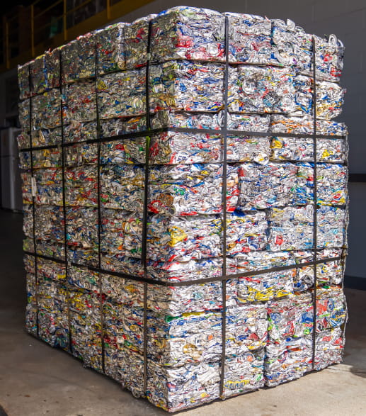 Crushed aluminum cans waiting to be recycled.